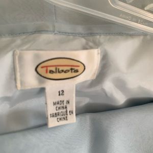 Off shoulder top with coordinating A line skirt.  Flatters any figure.